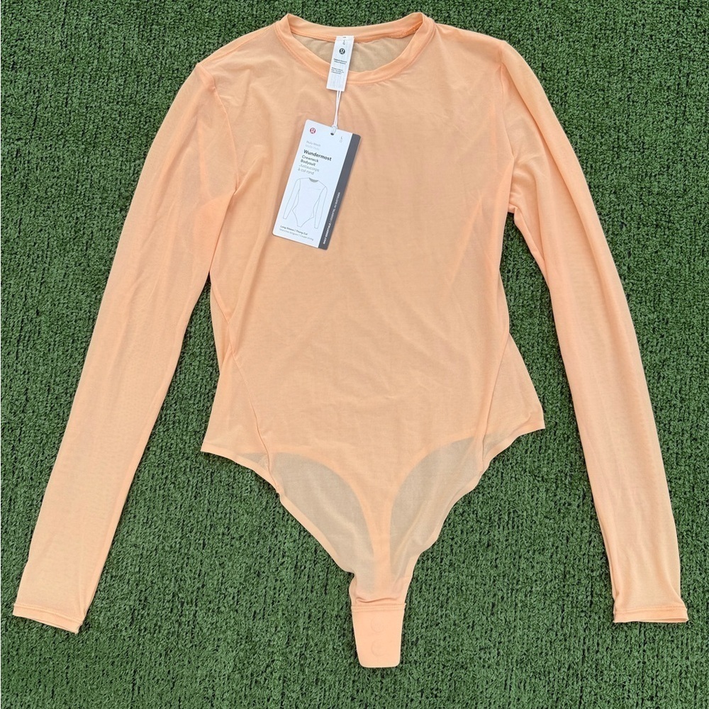Lululemon Wundermost Nulu Mesh Long-Sleeve Crewneck Bodysuit in Peach Bellini